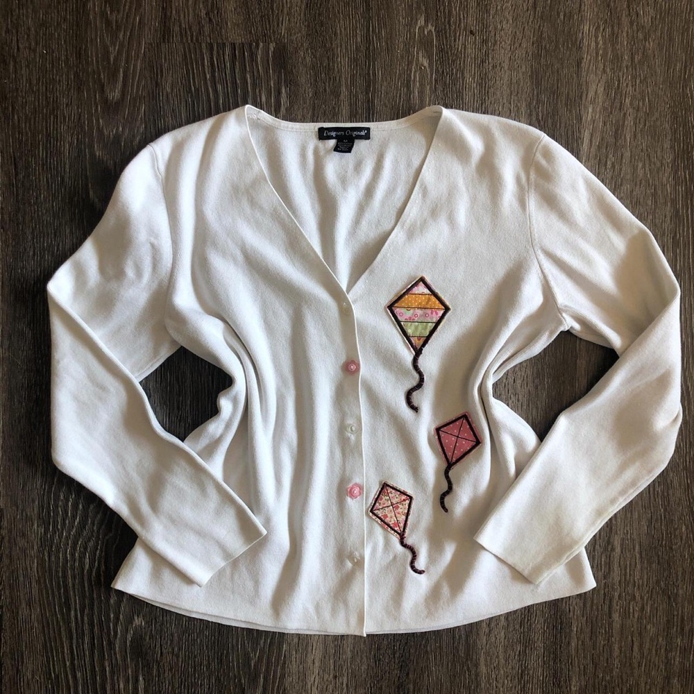 Upcycled cardigan w/kites appliqué/patches on the front and flower buttons